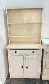 A white painted dresser with two shelves above base of single drawer and two cupboard doors, 81.