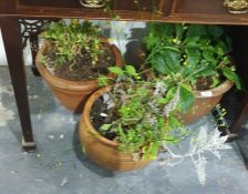 Two terracotta stone garden planters and another (3)