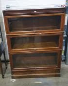 A 20th century oak three-sectional Globe Wernicke style bookcase, 91cm x 124cm
