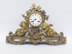 20th century ormolu mantel clock, the drum-shaped case with white enamel dial, inscribed 
