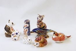 Eight Royal Crown Derby porcelain paperweights, Imari-pattern and similar, to include dolphin,