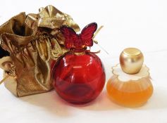 Annick Goutal grande 'Amour' red glass perfume bottle with butterfly stopper with gold drawstring