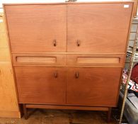 20th century teak cabinet by A H McIntosh & Co Ltd of Kirkcaldy, Scotland, the rectangular top above