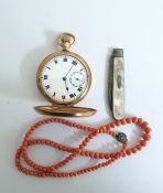 An American gold plated full hunter pocket watch with enamelled dial and roman numerals, together