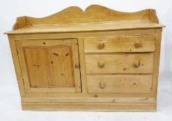 Pine dresser with three quarter gallery top, cupboard door to the left and three drawers to the