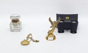 A pair of Negretti & Zambra field glasses, cased, a gilt-metal pendant formed as a purse, a figure