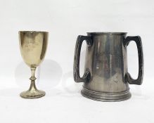 Pewter tyg emblazed 'Lancing College Football 6's 1893 and a trophy goblet 'Lancing College Kid 5'