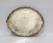 Silver oval tray with swagged border and raised upon four claw and ball feet, London 1779,