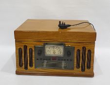 Crosley oak cased hifi system with radio, CD and 45 record player