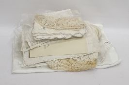 A quantity of linen, to include embroidered place mats, napkins and table cloths and crocheted place