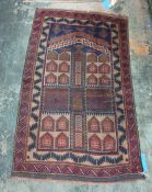 Eastern rug - blue ground, stepped border in  blues, reds, browns and greens 152 x92 cms