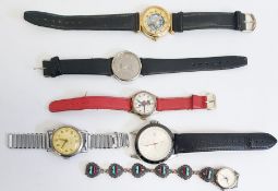 Quantity old wrist watches together with a pedometer
