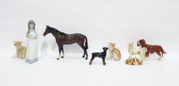Beswick model of a horse, 25cm long, a model of a spaniel, two various models of dogs, a pair of