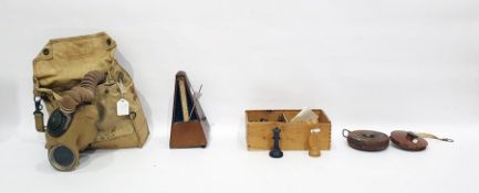 Gas mask by Siebe, Gorman & Co Ltd, a quantity of Players cigarette cards, a metronome, a part chess