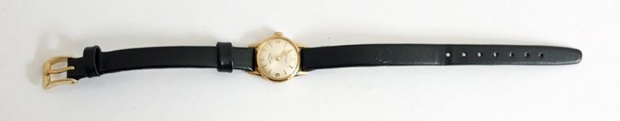 A lady's 9ct gold Rotary wristwatch with silver dial and gold batons, with another strap