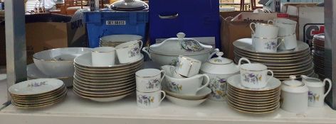 Part dinner service by Royal Limoges with bird of paradise pattern, all monogrammed 'MH' to base, to