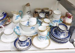 Booths Pottery 'Real Old Willow' pattern part tea service to include four tea cups, a coffee can,