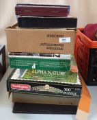 Quantity of puzzles, vintage and other games, boxed doll's china teaservice etc.