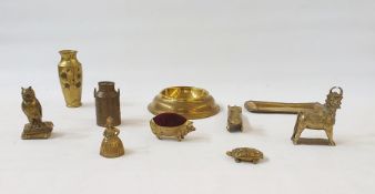 A quantity of brass and metalware, to include pipes, bells, door knockers, tobacco jars and covers