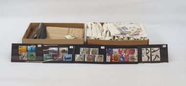 Two boxes of loose stamps, GB used on stock cards and partly filled approval books (2 boxes)
