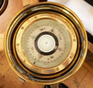 A ship's brass binnacle with gimbal compass, the removal pot with light the compass inscribed 