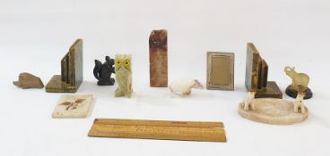Quantity of stone, alabaster and onyx, carved models of animals, a pair of stone bookends modelled