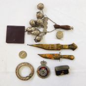 Assorted items to include white metal Brazilian, metal Eastern daggers, etc (1 box)