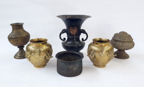 Quantity of Eastern brass and metalware, to include a pierced footed bowl and cover, cast with a