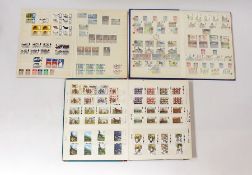 GB mint in 3 albums and display frame 1953 onwards - plenty of postage in the large album  (4)