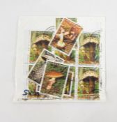 Six  boxes of thematic stamps ( 6 boxes)