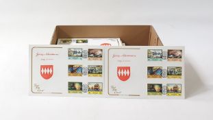 Eight boxes of Channel Islands and Isle of Man First Day Covers, most unaddressed, many hundreds (
