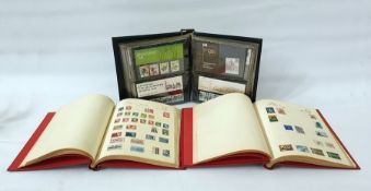 Three packets of Malayan stamps plus stock books and albums of miscellaneous stamps, together with