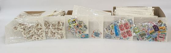 Two boxes of loose stamps of the world, box of stamps on paper and a large black bag and British