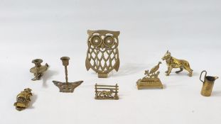 Quantity of brassware to include a pair of candlesticks, models of dragons, a pair of candlesticks