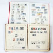 Seven albums and two stock books including Scott international postage stamp album, circa 1930