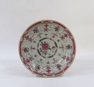 Chinese porcelain shallow dish, circular and decorated in famille rose colours, 19.5cm diameter