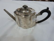 George III silver teapot  with serpentine sides, bright-cut engraving, Newcastle 1784, makers John