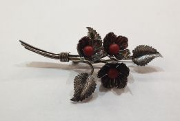 Charles Horner silver and coral spray brooch, the three flowerheads each set with central coral bead