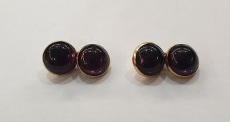 Pair of gold coloured metal and cabochon amethyst cufflinks, each double circle