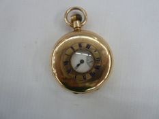Late Victorian and Edwardian gold plated half hunter fob watch, with subsiderary seconds dial