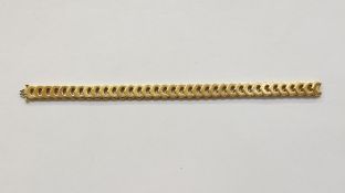 18ct gold Cartier bracelet of pointed horseshoe shaped links, no.915554, 35.4g total approx
