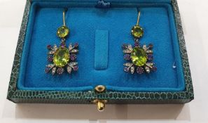 Pair of yellow and white metal, peridot, amethyst and diamond drop earrings, each with circular
