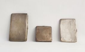 Three 20th century silver cigarette cases with engine-turned decoration, 13.3ozt (3)