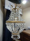 Cut glass and gilt chandelier pattern light fitting, with foliate scrolls, foliate gilt borders