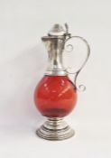 Victorian silver Gothic claret jug with fleur de lys engraving, scrolled handle and ruby ( not