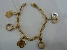 Cartier 18K charm bracelet hung with five detachable charms, 32.4g