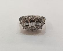 18ct white gold and diamond ring, elliptical-shaped, set three rectangular stones to the centre