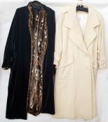 Cream wool overcoat, double-breasted with pockets and button half belt to the back, a grey wool