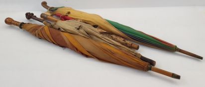 1920's/30's cotton parasol with multicoloured bakelite top on wooden handle, a fabric parasol with