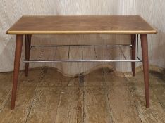 20th century rectangular coffee table with chrome slung paper rack under on circular section